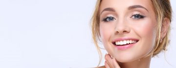 Young lady smiling after having dental filling